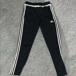Black Addidas pants.